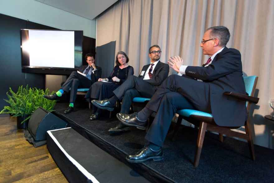 From right: Profs. Jonathan Lear, Anup Malani, Christine Mehring, and Stephen Sawyer speak at a panel discussion celebrating the Neubauer Collegium’s new building. (Photo: John Zich)